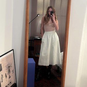 White leather midi with pockets!